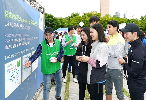 [크기변환][첨부사진3] SC제일은행 시각장애인 마라톤 대회서 ‘퓨처메이커스’ 캠페인 실시.jpg