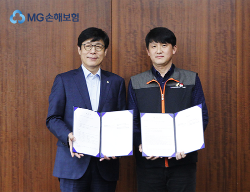 ▲ 박윤식 MG손보 대표이사(왼쪽)와 김동진 전국사무금융서비스노동조합 MG손보지부 위원장
