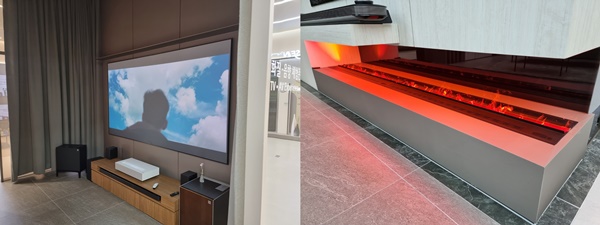 ▲거실 테마 전시관과 수증기로 화로를 연출한 월페이퍼의 모습